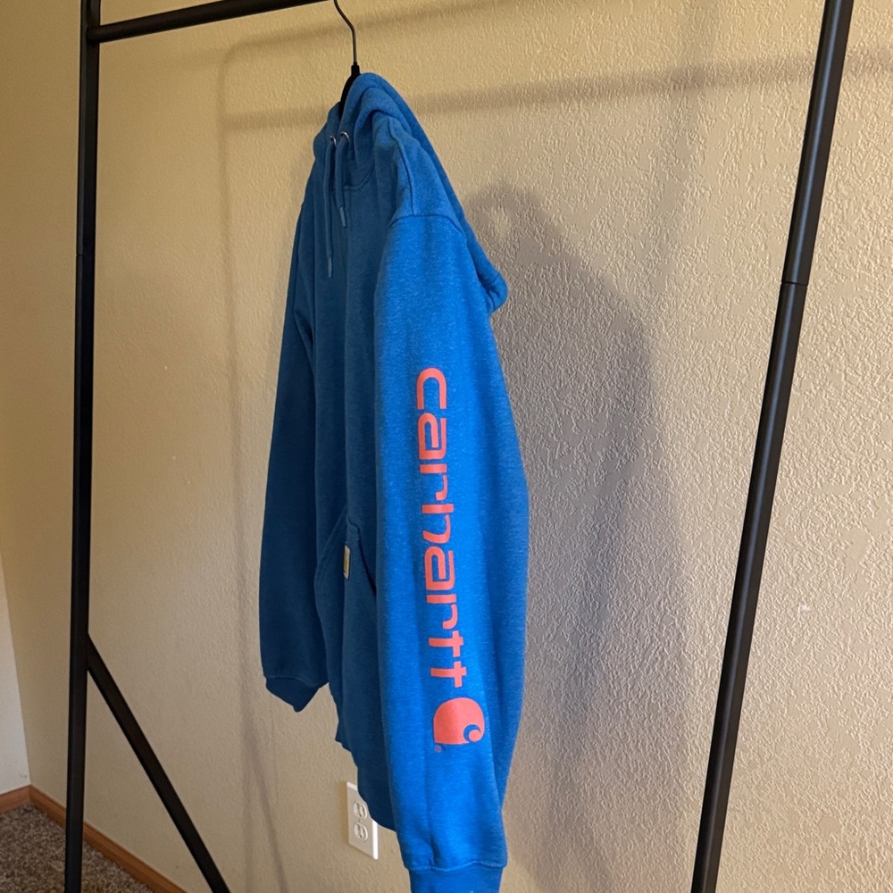 Carhartt Royal Blue Hoodie with Vibrant Orange sleeve logo! Never worn!!!!